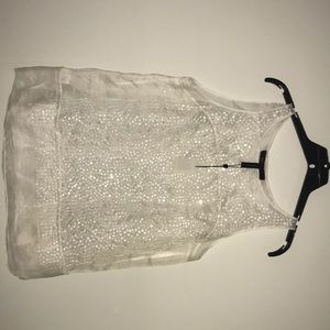 Sleeveless never worn BCBG sheer shirt sz small